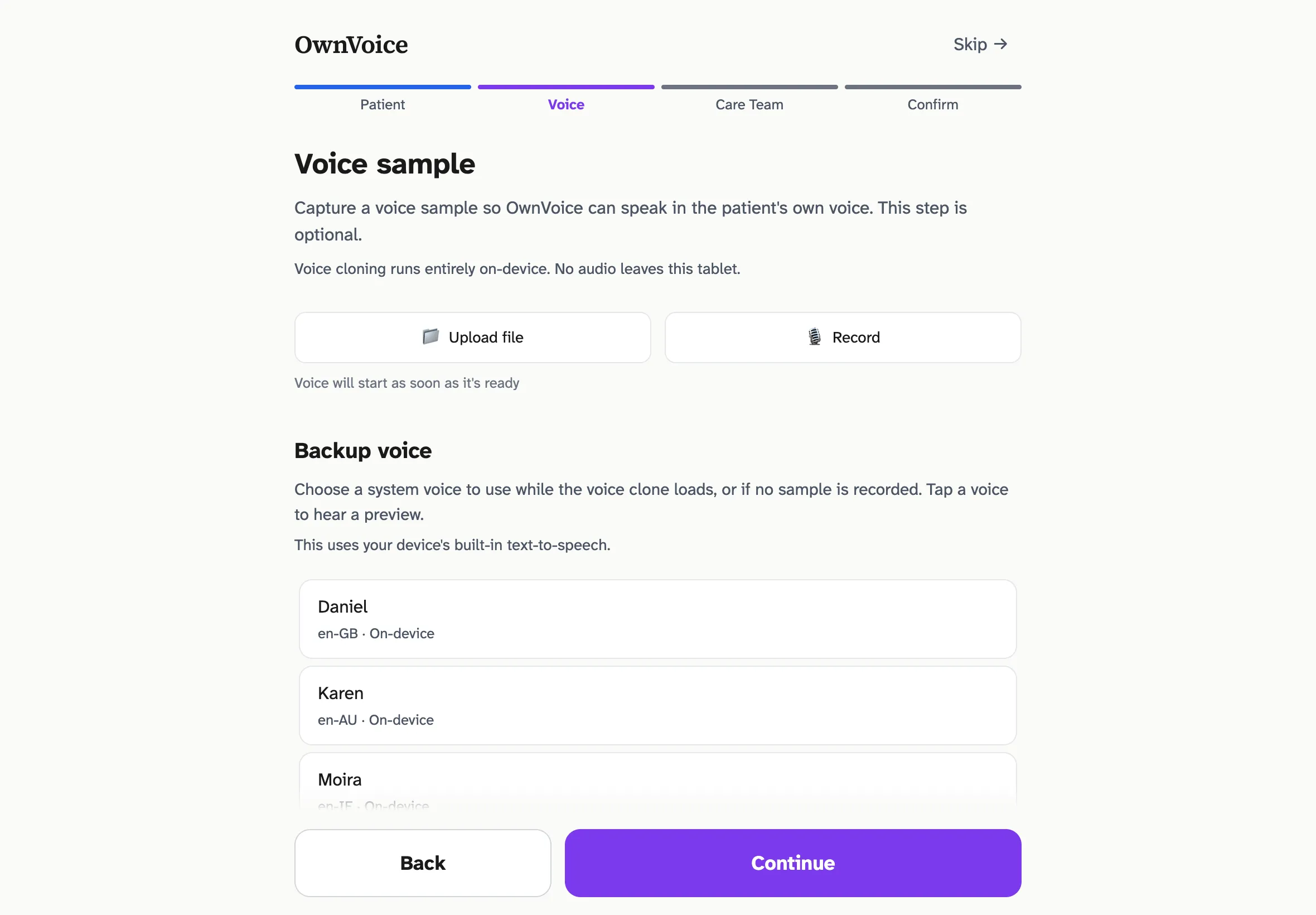The Voice sample step of setup. Heading 'Voice sample' with text 'Capture a voice sample so OwnVoice can speak in the patient's own voice. This step is optional. Voice cloning runs entirely on-device. No audio leaves this tablet.' Two buttons: 'Upload voice sample from file' and 'Record voice sample from microphone'. Below: a Backup voice section with system voice options including Daniel en-GB, Karen en-AU, Moira en-IE, Rishi en-IN, Samantha en-US, and Tessa en-ZA.